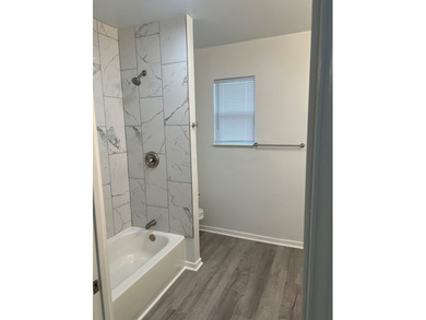 This beautifully updated 3-bedroom, 2-bath home features a - photo 14