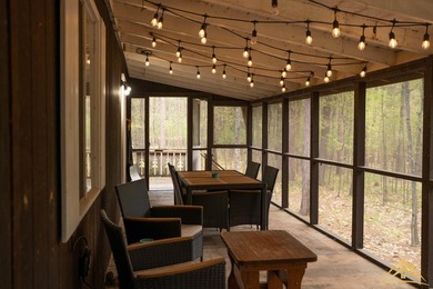 Tucked among the pines of Au Sable Acres, this fully furnished - photo 5