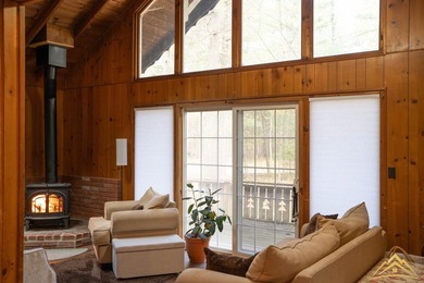 Tucked among the pines of Au Sable Acres, this fully furnished - photo 6