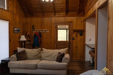 Tucked among the pines of Au Sable Acres, this fully furnished - photo 8