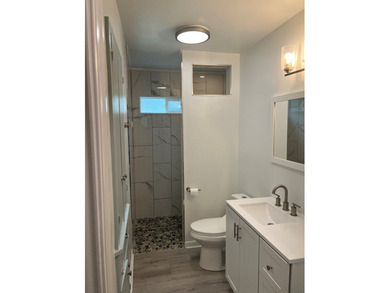 This beautifully updated 3-bedroom, 2-bath home features a - photo 18