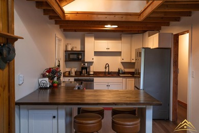 Tucked among the pines of Au Sable Acres, this fully furnished - photo 10