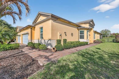 Experience low-maintenance living in LakePark at Tradition, an - photo 2