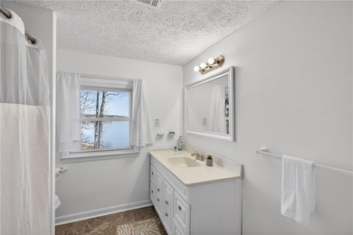 BRAND-NEW SEAWALL AND A NEWLY BUILT DOCK! Lakefront Luxury - photo 21