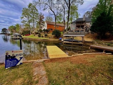 BRAND-NEW SEAWALL AND A NEWLY BUILT DOCK! Lakefront Luxury - photo 39