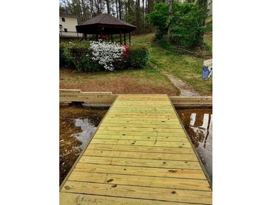 BRAND-NEW SEAWALL AND A NEWLY BUILT DOCK! Lakefront Luxury - photo 40