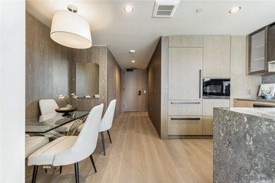 Discover unparalleled luxury in this high-floor 1-bd/1-ba - photo 8