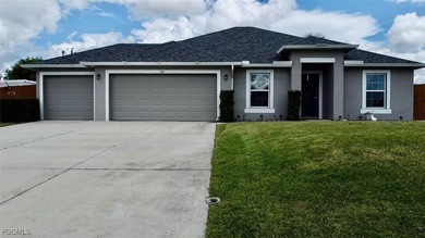 This beautiful well kept 3 bedroom, 2 bath, 3 car garage home is - photo 2