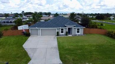 This beautiful well kept 3 bedroom, 2 bath, 3 car garage home is - photo 4