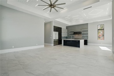 Panoramic Gulf and sand views define this elevated Gulf-front