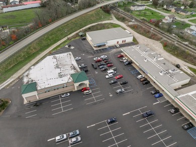 For the first time ever, this well-maintained shopping center is - photo 2