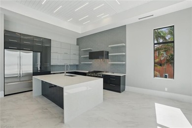 Panoramic Gulf and sand views define this elevated Gulf-front