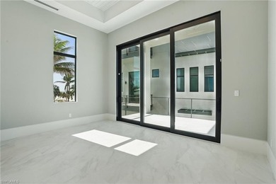 Panoramic Gulf and sand views define this elevated Gulf-front