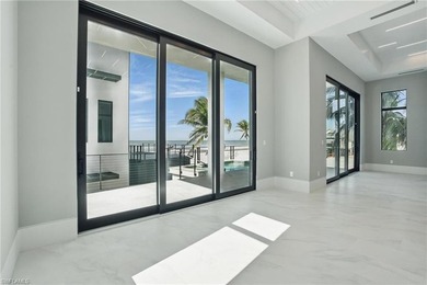 Panoramic Gulf and sand views define this elevated Gulf-front