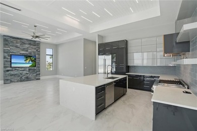 Panoramic Gulf and sand views define this elevated Gulf-front