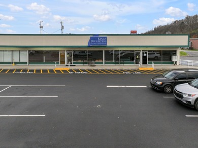 For the first time ever, this well-maintained shopping center is - photo 8