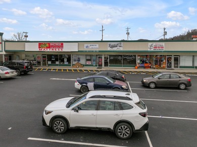 For the first time ever, this well-maintained shopping center is - photo 10