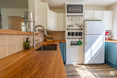 Don't miss this charming village home, thoughtfully updated and - photo 9