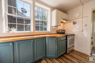 Don't miss this charming village home, thoughtfully updated and - photo 10