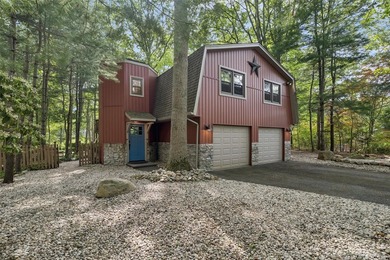 Tucked away among towering trees in the heart of Miller Place - photo 2