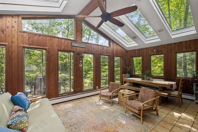 Tucked away among towering trees in the heart of Miller Place - photo 4