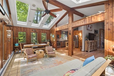 Tucked away among towering trees in the heart of Miller Place - photo 7