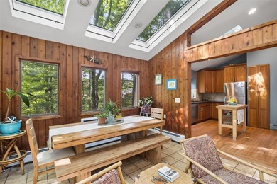 Tucked away among towering trees in the heart of Miller Place - photo 8