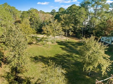 Nestled in the heart of Santa Rosa Beach, this exceptional - photo 12