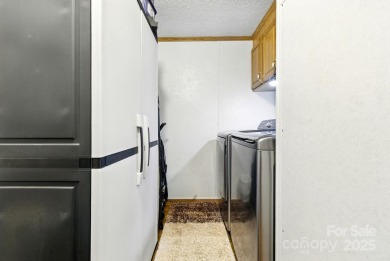 Welcome to this private 3-bedroom, 2-bathroom home located just