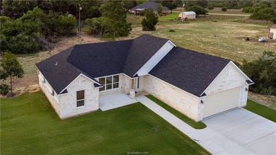 New construction on over half an acre in Hilltop Lakes. Situated - photo 1