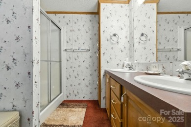 Welcome to this private 3-bedroom, 2-bathroom home located just