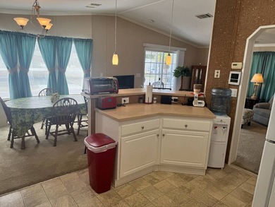 Welcome to this spacious and well-maintained 2008 mobile home - photo 10