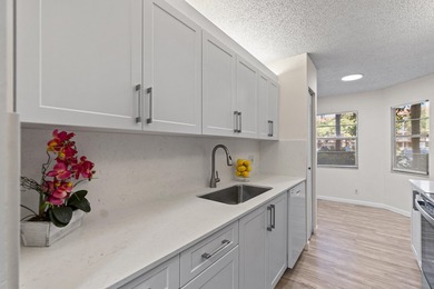 Beautifully renovated 2 BD, 2 BA first-floor condo in Century - photo 4