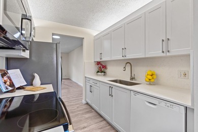 Beautifully renovated 2 BD, 2 BA first-floor condo in Century - photo 5