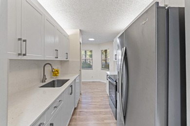 Beautifully renovated 2 BD, 2 BA first-floor condo in Century - photo 7