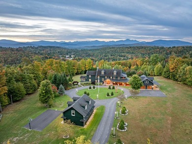 Set on 4.8 level acres w manicured lawns, this remarkable - photo 2