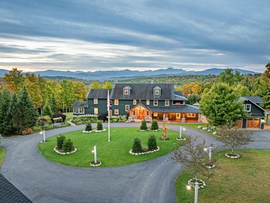 Set on 4.8 level acres w manicured lawns, this remarkable - photo 3