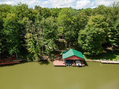 This visually stunning, premier lakefront log home on a - photo 8
