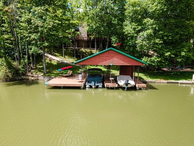 This visually stunning, premier lakefront log home on a - photo 9