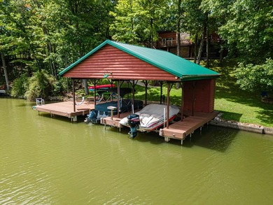 This visually stunning, premier lakefront log home on a - photo 10