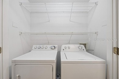 Enjoy wooded views from this second-floor condominium in The - photo 15