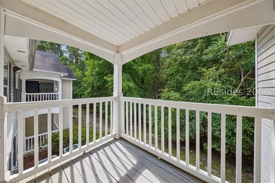 Enjoy wooded views from this second-floor condominium in The - photo 20