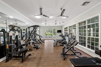 Enjoy wooded views from this second-floor condominium in The - photo 22