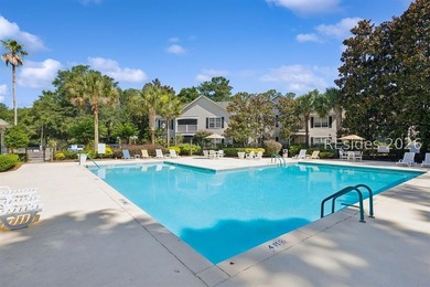 Enjoy wooded views from this second-floor condominium in The - photo 24