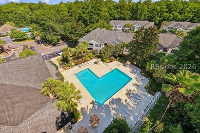 Enjoy wooded views from this second-floor condominium in The - photo 26
