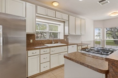 Nestled on a nicely landscaped spacious .66-acre corner lot in - photo 16