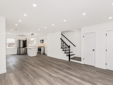 Immaculate Newly Renovated Brick semi attached 1 Family Home - photo 4