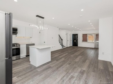 Immaculate Newly Renovated Brick semi attached 1 Family Home - photo 5