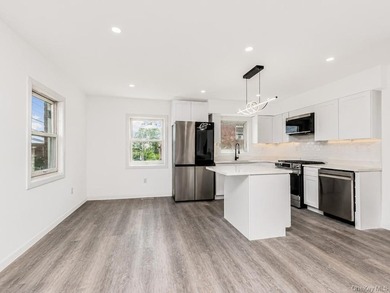 Immaculate Newly Renovated Brick semi attached 1 Family Home - photo 6