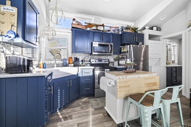 Escape to the lake in this adorable 2023 tiny home located in - photo 3